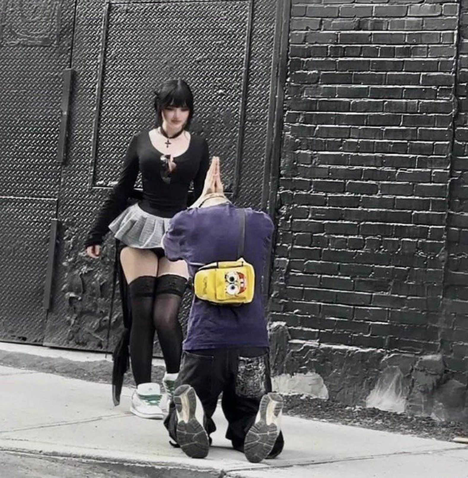 guy begging on his knees goth girl